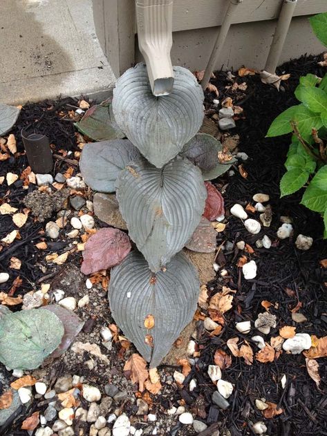 30 Best Downspout Ideas With Rocks To Beautify Your Landscape | Decor Home Ideas Downspout Landscaping, Downspout Ideas, Decorative Downspouts, Downspout Drainage, Downspout Diverter, Gutter Drainage, Splash Blocks, Landscaping Rock, Unique Garden Art