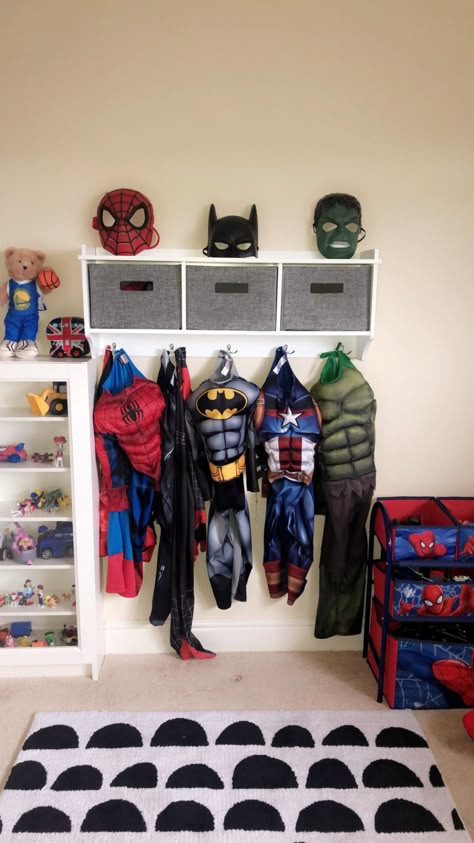 Boys Super Hero Costume Storage, Hero Up Costume Wall, Subtle Superhero Bedroom, Toddler Boy Superhero Bedroom, Super Hero Rooms For Boys, Super Hero Bedroom Ideas, Superhero Bedroom Boys, Modern Superhero Bedroom, Marvel Bedroom Ideas