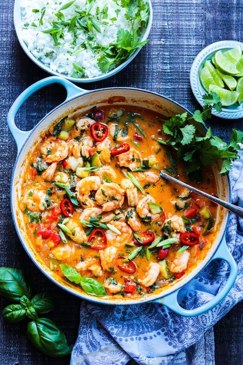 This coconut shrimp curry recipe is loaded with plump shrimp in a coconut red curry sauce that’s on the dinner table in 30 minutes! It's layered in flavor from the spicy Thai red curry paste, onion, garlic, ginger, fish sauce and coconut milk. A super easy, one pot meal that’s full of amazing flavor. Thai Red Prawn Curry Recipe, Red Curry Shrimp Thai Coconut Milk, Thai Red Curry Shrimp Recipe, Simmer Sauce Recipe, Red Pepper Curry, Thailand Recipes, Shrimp Curry Recipe, Coconut Shrimp Curry, Coconut Red Curry