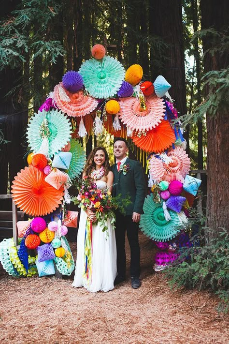 colorful paper fiesta wedding arch / http://www.himisspuff.com/colorful-mexican-festive-wedding-ideas/4/ Rustic Wedding Decorations, Wedding Ceremony Ideas, Fiesta Wedding, Woodsy Wedding, Paper Fan, Festive Wedding, Boda Mexicana, Wedding Ceremony Backdrop, Rainbow Wedding