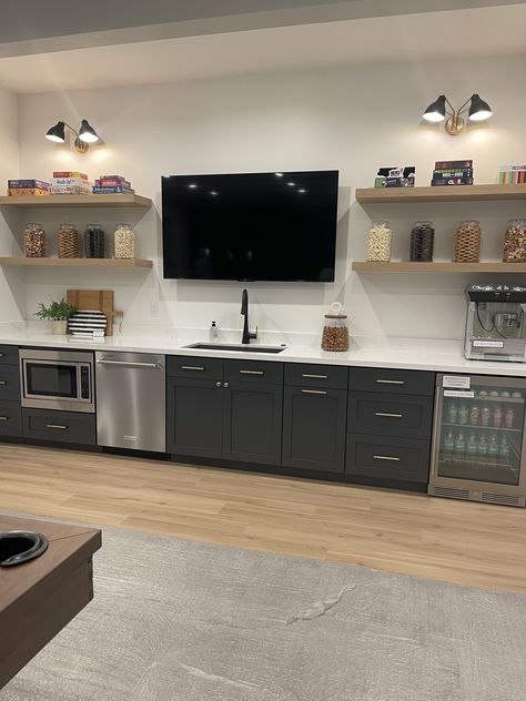 Home Bar With Tv And Shelves, Bar With Floating Shelves And Tv, Bar Wall With Tv, Small Basement Tv Room, Basement Bar With Tv In Middle, Built In Bar With Tv, Bar With Tv In Middle, Basement Bar Tv, Bar Tv Wall