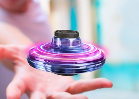 FlyNova flying spinner lets you perform incredible aerobatic tricks -   If you are looking for holiday gifts you may be interested in a unique flying spinner that is capable of performing “incredible aerobatic tricks” say its designers. FlyNova is now available to back via Indiegogo … Flying Spinner, Flying Helicopter, Fly Ball, Flying Toys, Mini Drone, Rgb Led Lights, Kids Toy Gifts, Rc Drone, Kids Lighting