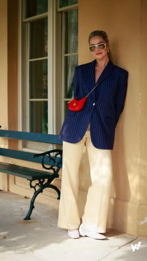 Attendee of Australian Fashion Week wears navy striped blazer and butter yellow pants. Yellow Street Style, Colorful Work Outfits, Butter Yellow Outfit, Yellow Blazer Outfit, Bvlgari Bag, Australian Fashion Week, Fashion Week 2024, Australia Fashion, Ideal Wardrobe