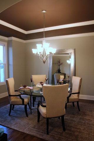 How about painting a layer of chocolate on those ceilings to give your room an overall warmth without having the room feel too small or dark. Make sure you accent the ceiling with bright white moldings for a sharp contrast. Brown Ceiling, Good Living Room Colors, Ceiling Color, Brown Dining Room, Dark Ceiling, Pool Table Room, Colors For Living Room, Dining Room Paint, Ceiling Design Modern