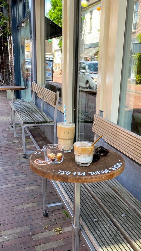 Small Coffee Shop Seating, Small Town Cafe Aesthetic, Amsterdam Coffee Shop Aesthetic, Outdoor Cafe Aesthetic, London Cafe Aesthetic, Cafe Outdoor Seating, Aesthetic Ice Coffee, Barista Girl, Outdoor Seating Cafe