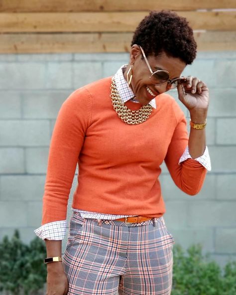 Orange cashmere sweater, layered over plaid button down shirt, plaid pants, orange Converse Chuck Taylors, orange belt Fall 2023 Outfits Work, Preppy Fall Work Outfits, Orange Sweater Outfit, Sweaters Outfit, Stylish Business Outfits, Plaid Pants Outfit, Fashionable Work Outfit, Eclectic Fashion, Black Women Fashion