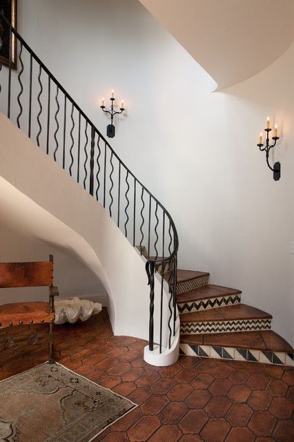 Tile Mediterranean Staircase, Iron Staircase Railing, Spanish Style Tile, Tiled Staircase, Rustic Staircase, Foyer Stairs, Wrought Iron Staircase, Foyer Flooring, Iron Staircase