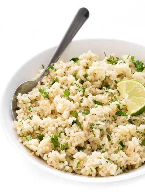 Healthy Cilantro Lime Brown Rice | chefsavvy.com Instant Pot Cilantro Lime Rice, Cauli Rice Recipe, Lime Brown Rice, Cilantro Lime Brown Rice, Lime Cauliflower Rice, Cilantro Lime Rice Recipe, Taco Side Dishes, Lime Rice Recipes, Cilantro Lime Cauliflower Rice