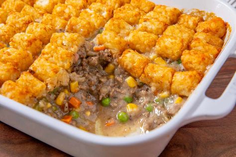 This Midwestern Casserole Is a Favorite for a Reason Cattle Drive Casserole, Tater Tot Hotdish, Easy Ground Beef Recipes, Hotdish Recipes, Easy Ground Beef, Cattle Drive, Tot Casserole, Tater Tot Casserole, Crowd Pleasing Recipes