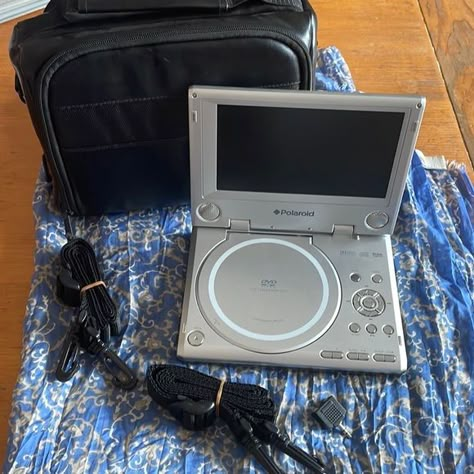 Polaroid portable DVD player with black leather case Dvd Player Aesthetic, Dvd Aesthetic, 2000s Technology, Sara Core, Player Aesthetic, No Social Media, Nostalgia 2000s, Aesthetic 2000s, Physical Media