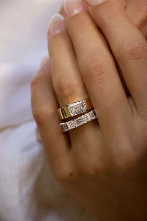 Our emerald cut lab-grown diamond is carefully curated. The half bezel set effortlessly accentuates the wide band. A classic ring shape with a modern look. Engagement Ring Inside Wedding Band, Gold And Silver Wedding Ring Set, Types Of Wedding Bands, Emerald Engagement Ring Stack, Bridal Stack, Thick Band Engagement Ring, Wide Band Engagement Ring, Traditional Ring, Wedding Ring Guide