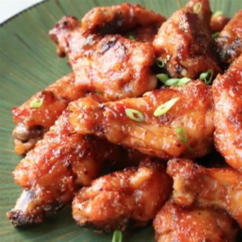 Spicy PBJ Wings Recipe | Allrecipes Japanese Chicken Wings, Honey Sriracha Chicken Wings, Sriracha Chicken Wings, Sticky Chicken Wings, Best Chicken Wing Recipe, Honey Sriracha Chicken, College Food, Parmesan Chicken Wings, Chicken Wing Sauces