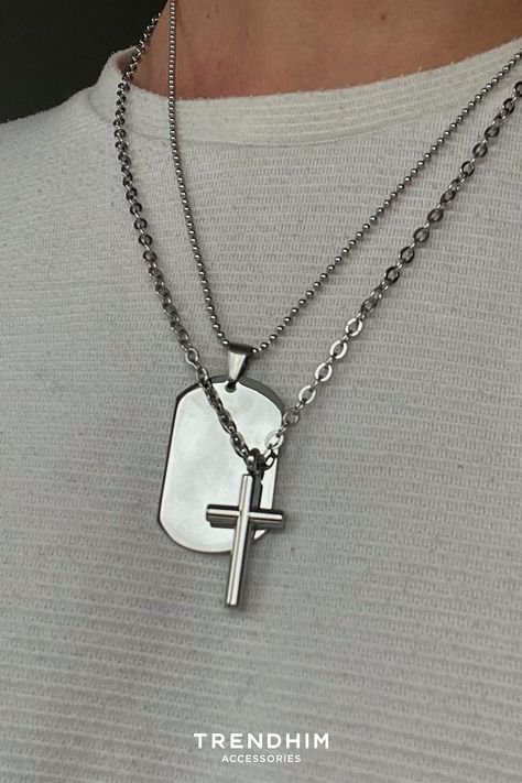 Man wearing silver necklaces one in a shape of cross and a dog tag. Necklace For Men Aesthetic, Cross Necklace Aesthetic Men, Christian Necklace Men, Mens Cross Necklace Silver, Viking Necklace Men, Mens Dog Tag Necklace, Men’s Crucifix Necklace, Mens Leather Necklace, Mens Cross Necklace