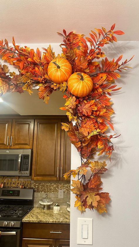 Kendra Valerio Toribio | Fall arrangement DIY🍁 Made this beautiful garland arrangement last year for my friend @sobeidafernandez19 in the entrance of her kitchen.... | Instagram Fall Garland Above Kitchen Cabinets, Fall Arrangements Diy, Daycare Thanksgiving, Have A Beautiful Evening, Diy Fall Garland, Thanksgiving Decorations Outdoor, Modern Fall Decor, Fall Decor Diy Crafts, Thanksgiving 2024