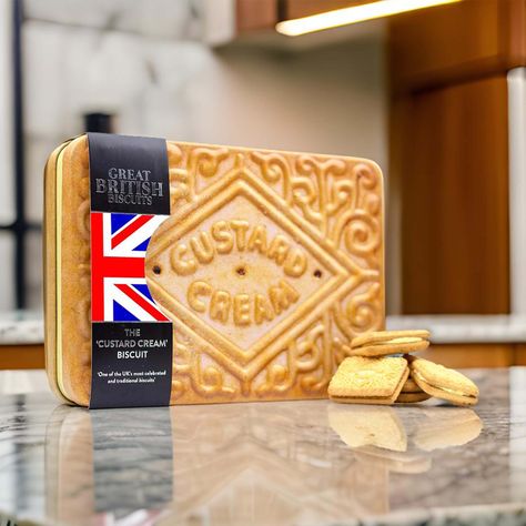 Indulge in the iconic taste of Britain with our Giant Custard Cream Biscuit Tin, filled with the beloved Custard Creams. Each bite is a delightful combination of silky vanilla custard buttercream and crispy vanilla biscuits, delivering a nostalgic treat that's perfect for any occasion. Biscuits: 450g Custard Cream Biscuits L242 x W170 x H43mm. Custard Buttercream, British Cookies, Custard Creams, Bourbon Biscuits, British Biscuits, Vanilla Biscuits, Biscuit Packaging, British Gifts, Custard Cream