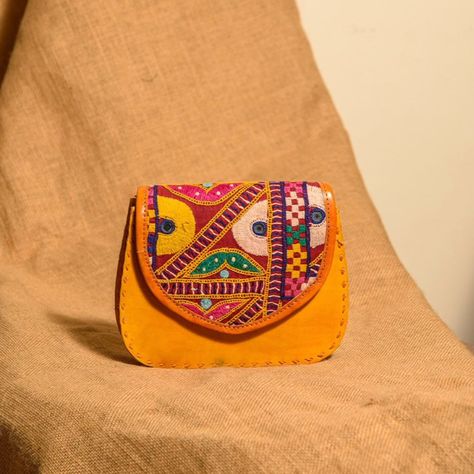 Think of a more rustic and beautiful accessory .. a lovely jugalbandi of rugged leather and vibrant Rajasthani embroidery ... #artoninstagram #india #design #handmade #madeinindia #artisans #india_gram #tourism #incredibleindia #shoplocal #smallbusiness #art #artist #indianart #indianartist #craft #handmade #handcrafted #travel #culture #sustainablefashion #indianculture #photography #embroidery #jawaja Rajasthani Bags Handmade, Handicraft Product Photography, Photography Embroidery, Rajasthani Embroidery, Purse Photography, Sadu Bharat, Rajasthani Culture, Rajasthani Art, Mehndi Designs For Kids