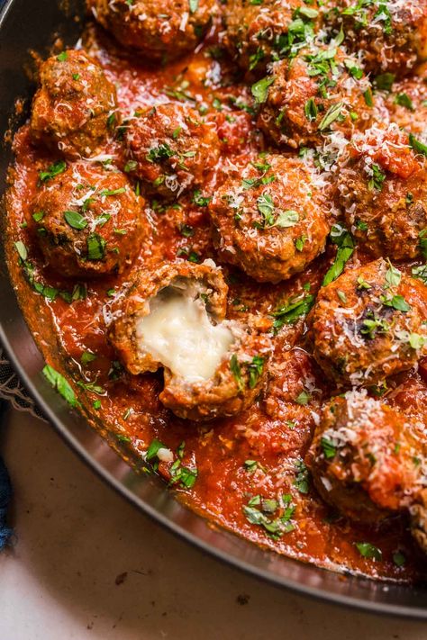 Mozzarella Stuffed Meatballs are cheesy, melty Italian meatballs perfect for appetizers or topping your favorite Italian main dish. Recipes Using Marinated Mozzarella Balls, Ground Beef Recipes Meatballs, Cheese Filled Meatballs, Real Italian Meatballs, Spicy Italian Meatballs, Stovetop Meatballs, Meatballs Sauce Recipe, Meatball Sandwich Recipes, Italian Pasta Recipes Authentic