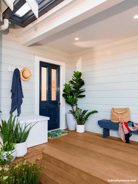 Open up to the idea of giving your entrance way a makeover. It’s the first thing your guests see when they arrive in your home and sets the tone for the rest of your house. Painting your front door a bold shade such as Resene Blue Night will give your home street appeal. This bold door is paired with weatherboards in Resene Half Periglacial Blue, trims in Resene Alabaster. Hamptons House Exterior, Painted Outdoor Furniture, Weatherboard House, Beach House Exterior, Exterior Color Schemes, Casa Exterior, Hamptons House, Colour Inspiration, Hamptons Style