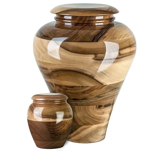 "Beautiful and very special wooden Walnut Cremation urn for ashes. Our stunning walnut urn is good choice for those who want a beautiful cremation urn for the ashes of their loved one. This urn is made entirely of walnut wood and has lots of texture from smooth curves to rough bark. Our stunning Wood Cremation Urn makes it a great choice to honor someone who enjoyed nature or who would appreciate keeping it simple. This urn has a pattern of rings of wood that give it interest and detail, much li Wood Casket, Cremated Remains, Wood Urn, Wooden Urn, Turning Projects, Urn For Ashes, Small Urns, Keepsake Urns, Keeping It Simple