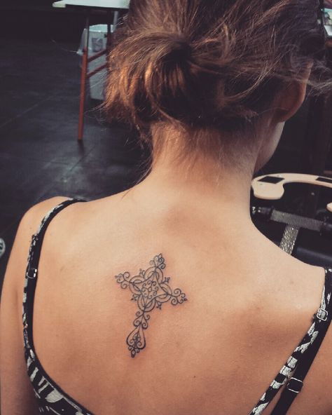 Finally got the tattoo I wanted 💕 love the placement! Cross Back Tattoo Women, Cross With Flowers Tattoo For Women On Back, Tattoo Back Placement, Cross Tattoo Placement For Women, Cross Tattoo Back Of Neck, Irish Cross Tattoo For Women, Celtic Cross And Rose Tattoo, Celtic Cross Back Tattoo, Irish Cross Tattoo