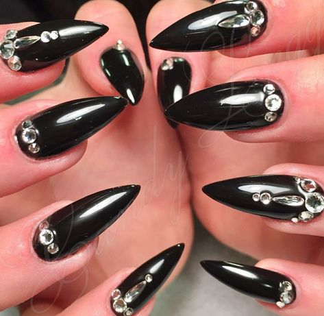 Stiletto Nails. Black Nails. Nails With Rhinestones. Acrylic Nails. Black Nails With Rhinestones Short, Black Almond Nails With Rhinestones, Black Bedazzled Nails, Black Stiletto Nails With Rhinestones, All Black Nails With Rhinestones, Black Rhinestone Nail Designs, Rhinestone Acrylics, Black Nails With Gems Rhinestones, Black Nails Rhinestones