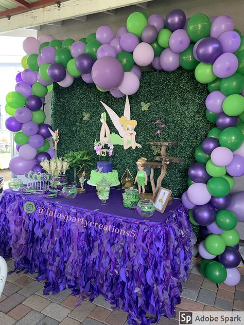 Cake table set-up for TinkerBell party. Purples and green balloon garland @lalaspartycreations5 Tinkerbell Birthday Party, Fairy Theme Birthday Party, Tinkerbell Party Theme, Tinkerbell Birthday, Fairy Baby Showers, Fairy Garden Birthday Party, Tinkerbell Party, Birthday Party Centerpieces