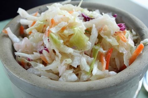 This recipe was given to my mother by a dear friend. I use pre-packaged slaw mix that has the carrots already in it and just add the onions. Also, I use Canola oil instead of Crisco. This can be made days in advance as it gets better as it sits. Marinated Slaw Recipe, Bojangles Coleslaw Recipe, Cajun Coleslaw Recipe, Marinated Slaw, Vinegar Slaw Recipe, Marinated Salad Recipes, Marinated Salad, Easy Coleslaw, Slaw Recipe