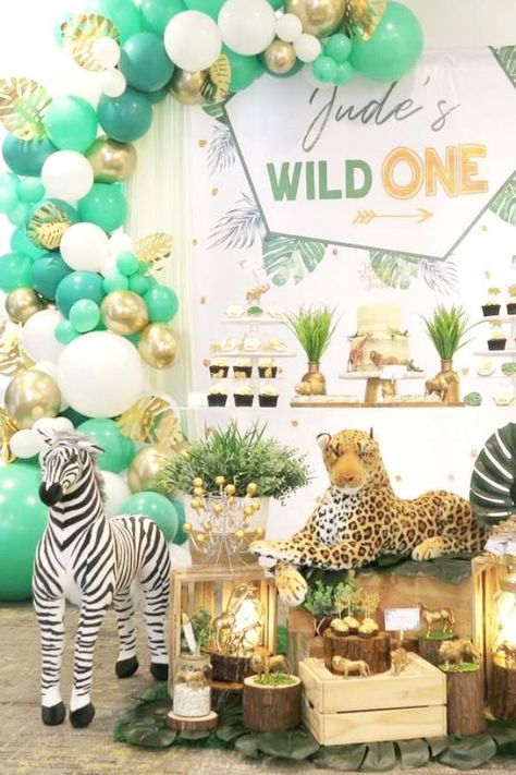 Wild One Safari / Jungle 1st birthday parties are one of the most popular party themes at the moment. Kids love wild animals, and with the release of the new live-action Lion King movie earlier in the year, safari and jungle parties seem to have been taken off. They are a great excuse to decorate with as many stuffed animals as physically possible See more party ideas and share yours at CatchMyParty.com Popular Party Themes, Jungle 1st Birthday, Animal Themed Party, Jungle Safari Birthday, Jungle Safari Party, 1st Birthday Party Decorations, Wild One Birthday Party, 1st Birthday Party Themes, Safari Birthday Party