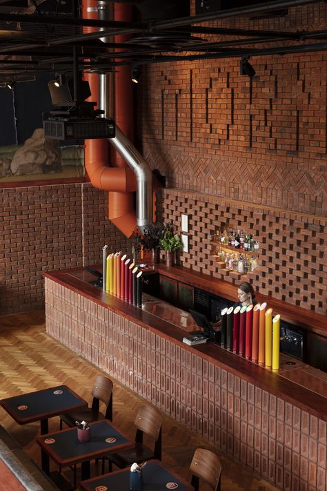 Brick Cafe Design, Brewery Interior Design Modern, Industrial Pub, Rustic Brewery Interior Design, Brewpub Interior, Rustic Industrial Restaurant Interior, Brick Restaurant, Brick Cafe, Upholstered Banquette