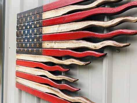 "Add some rustic charm to your home decor with this tattered American battle flag. The American battle flag sign has tattered ends to represent old glory standing proud and true after the smoke of a valiant battle has cleared. Available in three sizes. 24\", 36\", and 48\". The finish of this wooden American battle flag is age distressed to lend an old and weathered appearance. You will swear that it is an antique piece of art. The backside of this American flag sign is stained in Ebony and has American Flag Diy, Tattered American Flag, Old American Flag, American Flag Photos, Flag Diy, Rustic American Flag, Battle Flag, 4th July Crafts, Wooden American Flag