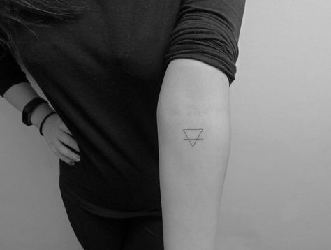 Earth alchemy symbols tattoo on the left inner forearm. Earth Element Symbol Tattoo, Earth Alchemy Tattoo, Earth Symbol Tattoo, Alchemy Tattoos, Uni Bedroom, Earth Symbol, Simple Line Tattoo, Tattooed People, Alchemy Tattoo