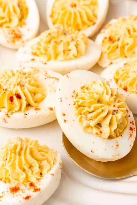 Try these Million Dollar Deviled Eggs at your next party for the perfect finger food. They are easy to make and can be prepared ahead of time, making them a convenient and stress-free appetizer. The secret to these delicious deviled eggs is the combination of creamy mayonnaise, tangy Dijon mustard, and crispy bacon! Easy Devil Eggs 4 Ingredients, Million Dollar Eggs, Deviled Eggs Dijon Mustard, Deviled Eggs With Dijon Mustard, Devil Eggs Recipe, Sweet Deviled Eggs, Mustard Deviled Eggs, Million Dollar Deviled Eggs, Deviled Eggs Recipe Best