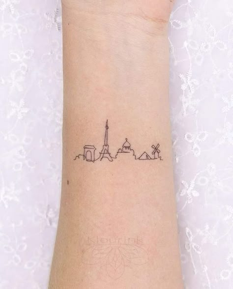 The 90 Most Popular Symbols For Travel Tattoos | Unique & Cute Travel Tattoo Ideas Interrailing Tattoo, Tattoos To Get In France, Paris Tattoo Ideas France, Paris Skyline Tattoo, Europe Trip Tattoo Ideas, The Simpsons Tattoo Minimalist, Tiny Eiffel Tower Tattoo, Tiny Paris Tattoo, France Inspired Tattoo