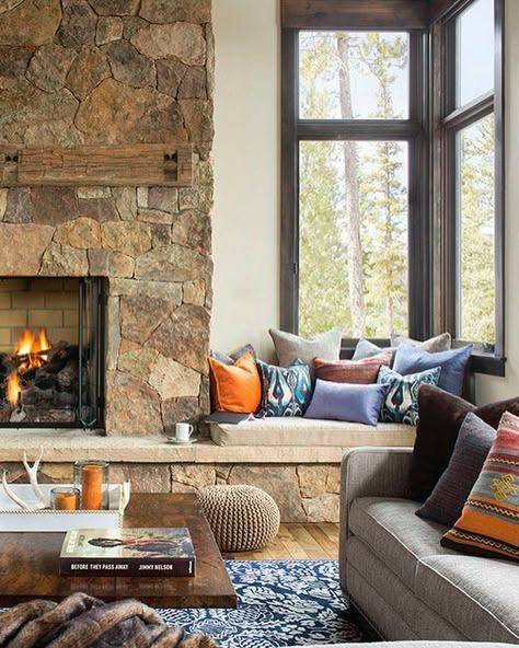 Modern.Rustic.Dreams on Instagram: “Where better to put a window seat than next to a gorgeous stone fireplace? Each stone was strategically placed! 😲” Fireplace Seat, New Build Fireplace, Modern Rustic Lake House, Stone Fireplace Living Room, Corner Stone Fireplace, Windows Seat, Build Fireplace, 4 Seasons Room, Retro Beach House