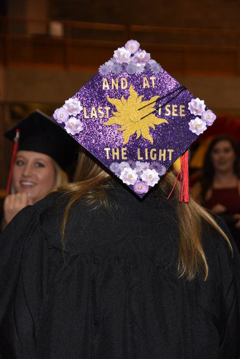 Repunzle Graduation Cap, Graduation Cap Designs Interior Design, Purple Graduation Cap Designs, Graduation Cap Designs Rapunzel, Olivia Rodrigo Grad Cap, Grad Cap Ideas Tangled, Graduation Cap Designs Twilight, Tinker Bell Graduation Cap, Scream Graduation Cap