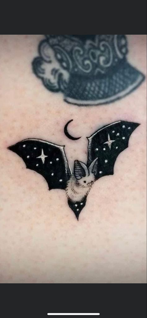 Cute star bat tat Galaxy Bat Tattoo, Spooky Wrist Tattoos For Women, Bat Tattoos Cute, Bat Halloween Tattoo, Bat And Stars Tattoo, Mini Bat Tattoo Ideas, Star Wings Tattoo, Glitter Bat Tattoo, Bats And Stars Tattoo