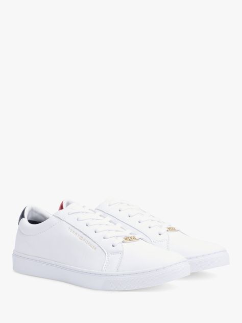 Crisp white kicks? Add these to your collection. The Tommy Hilfiger Essential Trainers boasts a white leather upper with a metallic red accents. This court kick is finished with branding throughout. Tommy Hilfiger Shoes Women, Tommy Hilfiger White Sneakers, Trendy Shoes Sneakers, Best Casual Outfits, White Kicks, Trainer Heels, Tommy Hilfiger Shoes, Trainers Fashion, White Trainers