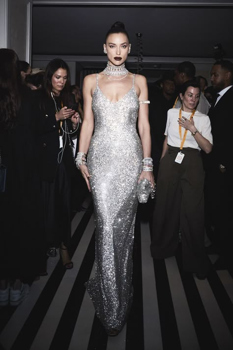 Irina Shayk represented Air in a crystal mesh couture gown designed by Global Creative Director Giovanna Engelbert, that took 200 hours to create. The form fitting look created the illusion of light skimming her body, evoking the fluid movement and ethereal nature of the element. The model’s brilliance was intensified with a bespoke Millenia choker and ear cuffs, and layers of Hyperbola and Millenia bracelets. #Swarovski #SwarovskiMillenia #SwarovskiHyperbola #MetGala Nice Long Dresses, Jewellery Luxury, Fashion Red Carpet, Gala Event, Couture Gown, Couture Looks, Gala Events, The Met Gala, Karlie Kloss