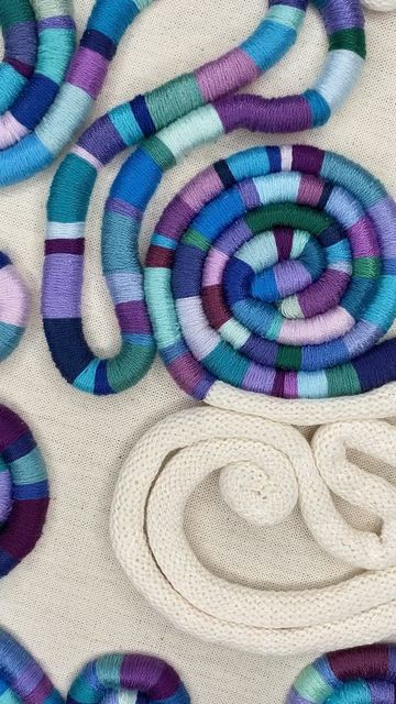 Myrte Biondić on Instagram: "Lots of questions about how I cover the “WORM” 1. I am using 3 out of the 6 strands #dmc embroidery thread. 2. I go down through the backdrop fabric on one side and up on the other side of the thread/worm. 3. The is not a name for this techniek it is similar to a satin stitch. Don’t pull to hard just lay the thread on top of the worm. 4. It’s very beginner friendly no skill needed. 5. You can use any embroidery thread. Want to make you own smaller version check Spiral Stitch Embroidery, Embroidery Thread Macrame, Embroidery Spiral, Spiral Embroidery Pattern, Worm Embroidery, Bridal Lenghas, Backdrop Fabric, Crewel Embroidery Patterns, Embroidery Lessons