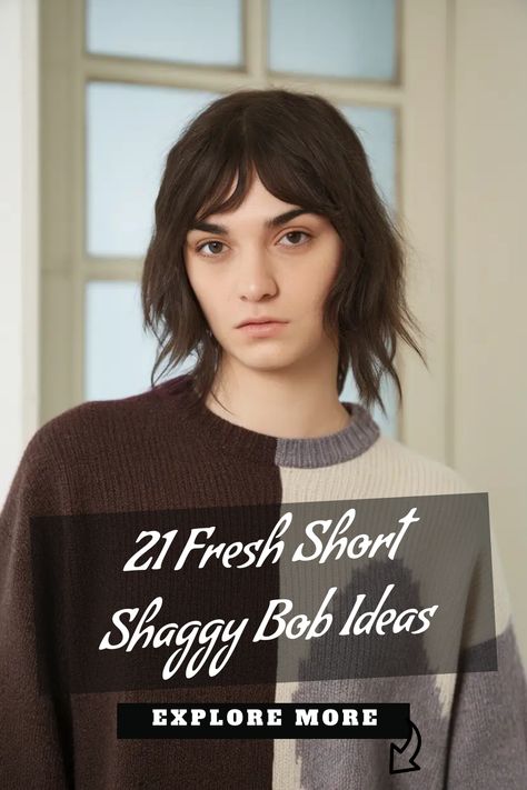 Person with a short, shaggy bob haircut wearing a two-toned sweater, with text overlay promoting hairstyle ideas. Short Shag Bob, Short Shaggy Hair, Shag Bob, Short Shaggy Bob, Curly Shag Haircut, Bob Ideas, Short Shaggy Haircuts, Textured Bangs, Shaggy Short Hair