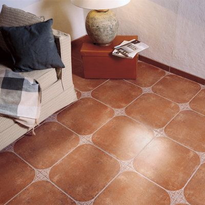 Offering a simplistic look, our Aranjuez Ceramic Floor and Wall Tile features a mixed textured, satin finish, making it a great choice for your space. With its semi-vitreous features, this brown square tile is an ideal selection for indoor residential installations, including kitchens, bathrooms, backsplashes, showers, hallways and fireplace facades. This tile is a perfect choice on its own or paired with other products in the Aranjuez Collection. Tile is the better choice for your space! | Mero Fireplace Facade, Moroccan Wall, Terracotta Floor, Back Wallpaper, Tile Ceramic, Merola Tile, Spanish Tile, Kitchen Floor Tile, All I Ever Wanted