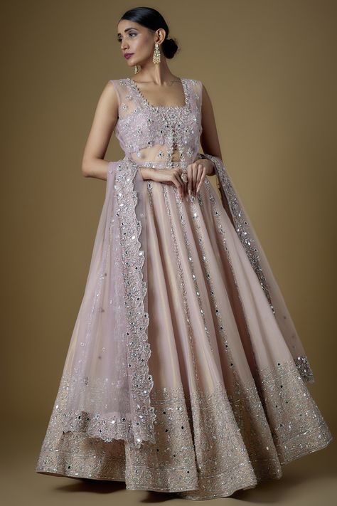 Featuring a blush pink lehenga in tissue georgette base with mirror, zardosi, cut beads, sequins and zari details. It is paired with a matching choli, a jacket and a tulle dupatta. . #perniaspopupshop #whatiworewastrending #ppuslove #fatiz #lehenga Elegant Pink Lehenga With Sheer Dupatta, Glamorous Pink Lehenga With Sheer Dupatta, Pink Embellished Evening Lehenga, Glamorous Pink Georgette Lehenga, Pink Hand Embellished Organza Lehenga, Blush Pink Lehenga, Ritu Kumar, Pink Lehenga, Embroidered Lehenga