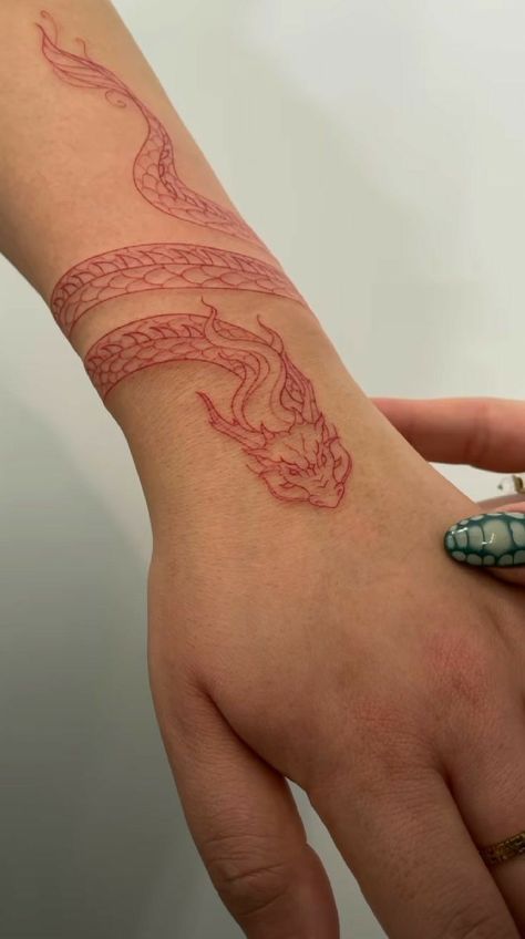 Red Ink Dragon Tattoo Arm, Dragon Tattoo In Arm, Dragon Tattoo Around Wrist, Forearm Tattoo Women Wrap Around, Arm Tattoo Wrap Around, Red Ink Tattoos Dragon, Wrap Dragon Tattoo, Dragon Ankle Tattoo Wrap Around, Dragon Wrapped Around Wrist Tattoo