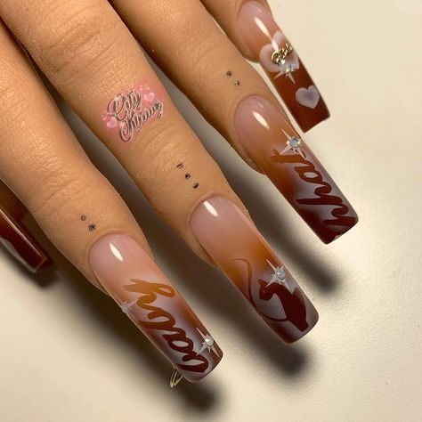 PRE$$ ON NAIL$🕊 on Instagram: “BABY PHAT $WEAT $UIT IN$PO🤎 AVAILABLE NOW ✨ LINK IN BIO Stencils - @_cultureaddicts_ (baby phat & sparkles) & @nailjerks (hearts) . . . . .…” Coffin Nails Matte, Fall Acrylic Nails, Y2k Nails, Coffin Shape Nails, Glow Nails, Coffin Nails Long, Fall Nail Colors, Nail Jewelry, Dope Nail Designs