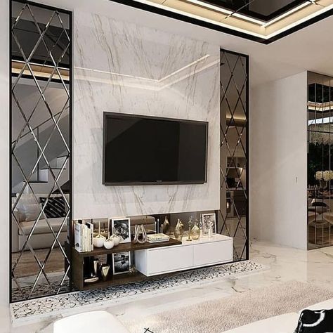 Mirror Panel Wall Interior Design Living Room, Tv Wall Design Mirror, Tv Wall Mirror Design, Tv Wall With Mirror Ideas, Tv Unit Design With Mirror, Mirror In Tv Unit, Tv Unit Mirror Design, Mirrored Tv Wall, Tv Unit With Mirror Design Modern