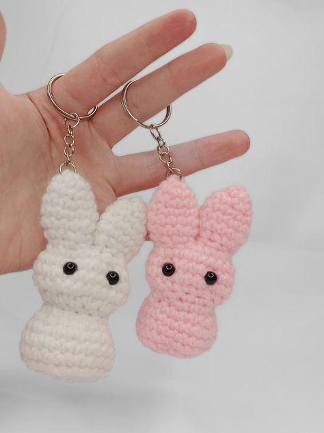 Handmade Crocheted Bunny Keychain | Easter Marshmallow Purse Charm | Marshmallow Bunny Amigurumi | Easter Rabbit Plushy | For Easter Basket Crochet toys patterns free amigurumi #crochettoyspatternsfreeamigurumi #crochet #crochettoy #crochetpattern #crochetpatterns 1.726 Chrochet Gifts, Cute Crochet Keychains, Crochet Origami, Toys Quotes, Amigurumi Easter, Crocheted Bunny, Easter Marshmallow, Crochet Keychains, Bunny Keychain