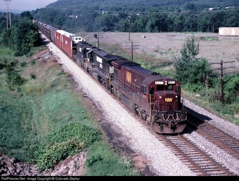 Delaware & Hudson train BFOA, Buffalo, NY, to Oak Island, NJ, had one of only six tuscan red and gold lettered N&W units. C30-7's in tuscan were 8010, 8076-8080. RailPictures.Net Photo: NW 8077 Norfolk & Western GE C30-7 at Endicott, New York by Colorado Zephyr Railroad Images, Railroad Pictures, Southern Railways, Norfolk Southern, Railroad Photography, The Virginian, Oak Island, Train Pictures, All Aboard