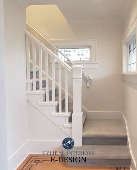 Learn all about Benjamin Moore Oxford White, as Kylie M Interiors Edesign reviews this POPULAR white paint colour for walls, trims, cabinets, exteriors and more! Shown in staircase with gray carpet and Benjamin Moore White Dove on the walls #white #oxfordwhite #benjaminmoore #whitepaint #paintedcabinets #kylieminteriors #kyliemedesign #edesign #colourconsultant #bestpaintcolours Oxford White Benjamin Moore, Painting Wood White, Trim Cabinets, Stairs Runner, White Stairs, Benjamin Moore White, Best White Paint, Popular Paint Colors, Painted Stairs