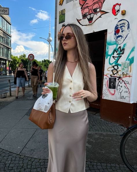 About fashion and my other passion🤭 cinnamon buns & iced matcha latte <3 Combined a vest to a satin skirt and I totally love the look🤍 What do you think? Satin Skirts, Satin Skirt Outfit, Vest Outfits For Women, Iced Matcha Latte, Iced Matcha, Long Vests, Stylish Work Outfits, Cinnamon Buns, Matcha Latte