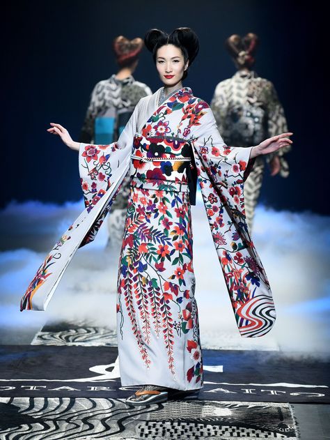 Kimono without rules: Models display creations by designer Jotaro Saito during Tokyo fashion week on March 16. | AFP-JIJI Japanese Kimono Dress, Japanese Fashion Trends, Japanese Fashion Designers, Tokyo Fashion Week, Traditional Japanese Kimono, Kimono Design, Japanese Dress, Tokyo Fashion, Japanese Street Fashion